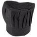 A black Chef Revival chef hat with ruffled fabric.