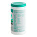 A cylindrical container of WipesPlus 8" x 7" 75 count lemon scent alcohol free surface disinfecting wipes with a teal lid.