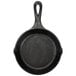 A Lodge black cast iron mini skillet.