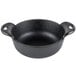 A black cast iron bowl with handles.