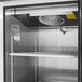 A Turbo Air M3 Series stainless steel half door reach-in freezer.