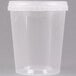 A clear plastic container with a white lid.