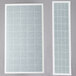 Two white rectangular Curtron insect trap glue boards with white squares.