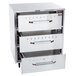 A stainless steel Hatco freestanding three drawer warmer.