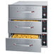 A Hatco freestanding three drawer warmer with two open drawers of food.