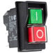 A close-up of an Avantco On/Off switch with black and green buttons and a white circle inside a red square.