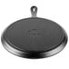 A Lodge pre-seasoned cast iron griddle with a handle.