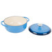 A Caribbean blue Lodge enameled cast iron Dutch oven with a white lid.