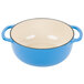A Caribbean blue enameled cast iron pot with two handles.
