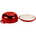 A red pan with a lid, the Lodge Island Spice Red Enameled Cast Iron Dutch Oven.