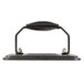 A Lodge pre-seasoned black metal grill press with a spiral design on the bottom.