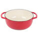 A red and white Lodge enameled cast iron pot with two handles.