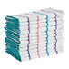 A stack of white towels with blue and red herringbone stripes.