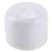 White plastic caps for Nemco Easy Cheese Blockers on a white surface.