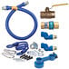 A blue Dormont gas connector kit with a hose and pipe.