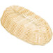 A natural-colored rattan oblong bread basket.