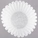 A white paper coffee filter with a black rim.
