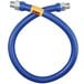 A blue Dormont stainless steel flexible gas hose with a yellow label.