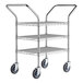 A Regency chrome metal utility cart with three shelves and wheels.