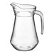 An Arcoroc clear glass pitcher with a handle.