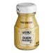 A Heinz Dijon Mustard bottle with a white lid.