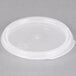 A Carlisle translucent plastic lid on a food storage container.