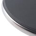 A close-up of a black circular surface.