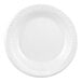 A close-up of a Dart white foam plate with a white edge.