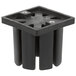 A black square Vollrath InstaCut push block with holes.