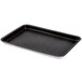 A black baking tray with holes.