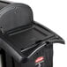 A black Rubbermaid plastic housekeeping cart trash can.