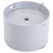 A white plastic circular container with a hole in it.