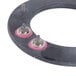 A black circular Nemco heating element with red and silver screws.