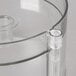 A clear plastic container with a screw on top.
