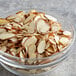 A glass bowl of Blue Diamond raw sliced almonds.