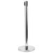 A chrome metal pole with a round base.