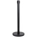 A black pole with a round base.