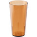 A close-up of a Cambro amber plastic tumbler.