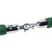 A green Aarco stanchion rope with chrome ends.