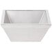 A stainless steel square bowl with a white background.