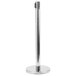 A chrome crowd control stanchion with a round metal base.