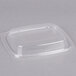 A Dart clear plastic container with a lid.