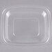 A Dart clear plastic dome lid on a rectangular plastic container.