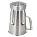 A stainless steel Waring blender jar with a handle.