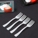 a row of plastic forks