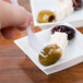 a close up of a green olive