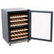 A black Eurodib wine refrigerator with wooden shelves.