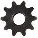 A close-up of a black sprocket with a hole in the middle.