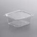 A Dart ClearPac clear plastic container with a flat lid.