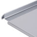 The metal shelf and corner of a Waring toaster drawer.